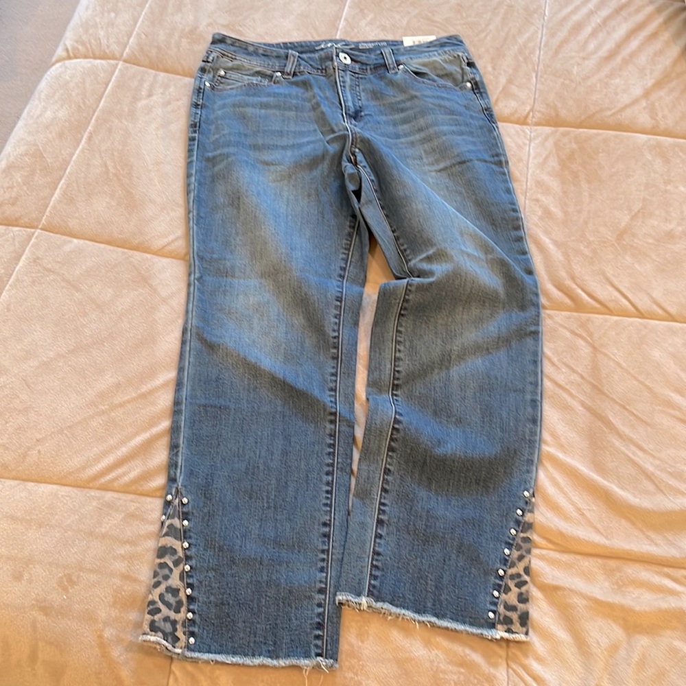 INC denim leopard print at leg opening